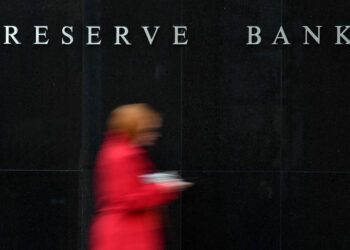 Australia to end stimulus but holds rates despite inflation surge