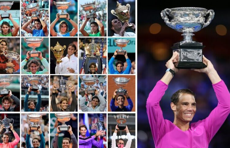 (COMBO) This combination of pictures created early on January 31, 2022 shows Spain's Rafael Nadal posing with the trophies of his 21 Grand Slam victories (from top L to bottom R) on June 5, 2005 during Roland Garros; on June 11, 2006 during Roland Garros; on June 10, 2007 during Roland Garros; on June 8, 2008 during Roland Garros; on July 6, 2008 during Wimbledon; on February 2, 2009 during the Australian Open; on June 6, 2010 during Roland Garros; on July 4, 2010 during Wimbledon; on September 13, 2010 during the US Open; on June 5, 2011 during Roland Garros; on June 11, 2012 during Roland Garros; on June 9, 2013 during Roland Garros; on September 9, 2013 during the US Open; on June 8, 2014 during Roland Garros; on June 11, 2017 during Roland Garros; on September 10, 2017 during the US Open; on June 10, 2018 during Roland Garros; on June 9, 2019 during Roland Garros; on September 8, 2019 during the US Open; on October 11, 2020 wearing a facemask during Roland Garros; and early on January 31, 2022 after winning the Australian Open at Melbourne (large image at R). (Photo by STF / AFP)