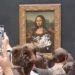 Man arrested after smearing Mona Lisa with cake at Louvre