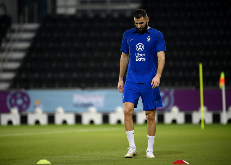 (FILES) In this file photo taken on November 17, 2022, France's forward Karim Benzema looks down during a training session at the Jassim-bin-Hamad Stadium in Doha, ahead of the Qatar 2022 World Cup football tournament. - Karim Benzema left a training session injured on November 19, 2022. He is to receive medical examinations to determine the nature and severity of his injury, prior to the FIFA World Cup match against Australia on November 22. (Photo by FRANCK FIFE / AFP)