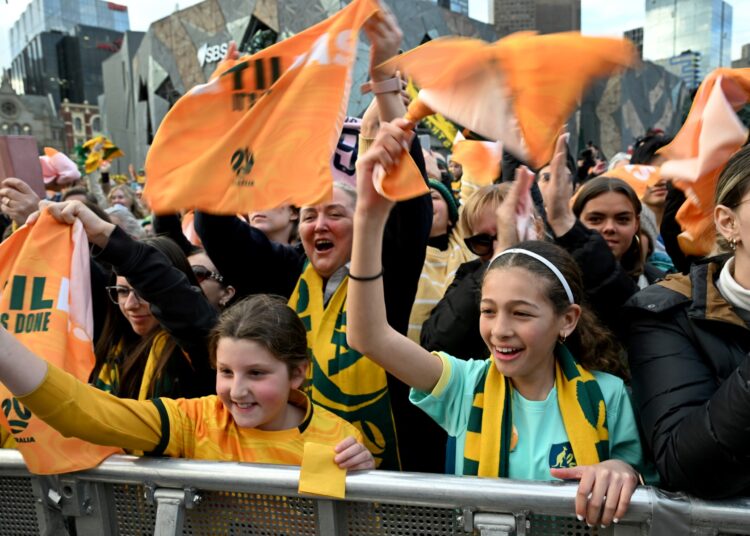 Fans cheer the Australia's women's football team during a public event where the team were presented with their jerseys in Melbourne on July 11, 2023, ahead of their international friendly against France. (Photo by William WEST / AFP)