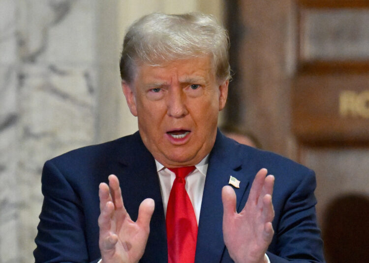 Former US President Donald Trump speaks to the media during the third day of his civil fraud trial in New York on October 4, 2023. - The civil trial comes after New York Judge Arthur Engoron already ruled that Trump and his sons Eric and Don Jr committed fraud by inflating the value of the real estate and financial assets of the Trump Organization for years. (Photo by ANGELA WEISS / AFP)