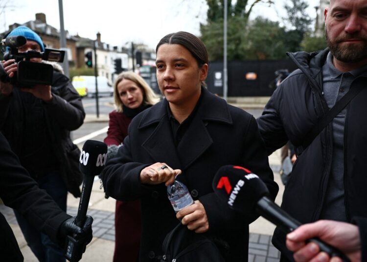 Chelsea's Australian striker Sam Kerr reacts as she arrives at Kingston Crown Court in south London on February 3, 2025, for the start of her trial. Kerr was charged with causing a police officer harassment, alarm or distress during an incident in Twickenham, south-west London, on January 30, 2023, and pleaded not guily to racially aggravated harassment in March of 2024. (Photo by HENRY NICHOLLS / AFP)
