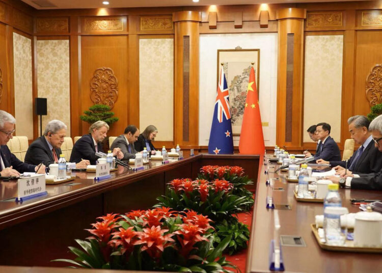 This handout photo released by the New Zealand Embassy in China shows New Zealand's Foreign Minister Winston Peters (2nd L) attending a bilateral meeting with Chinese Foreign Minister Wang Yi (2nd R) in Beijing on February 26, 2025. (Photo by Handout / New Zealand Embassy in China / AFP) / RESTRICTED TO EDITORIAL USE - MANDATORY CREDIT "AFP PHOTO /  NEW ZEALAND EMBASSY IN CHINA" - NO MARKETING NO ADVERTISING CAMPAIGNS - DISTRIBUTED AS A SERVICE TO CLIENTS