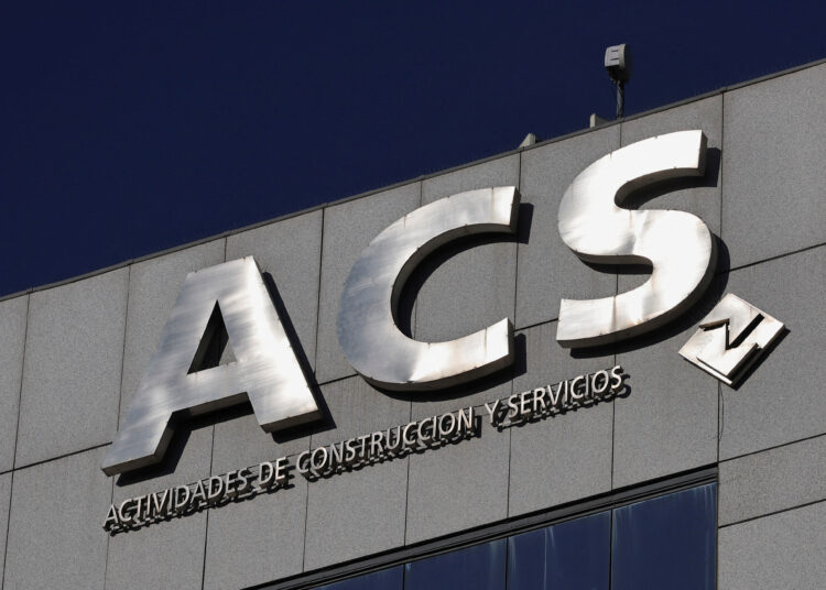 FILE PHOTO: The logo of Spanish construction conglomerate ACS is displayed atop the company's building in Madrid, Spain, February 10, 2023. REUTERS/Violeta Santos Moura/File Photo