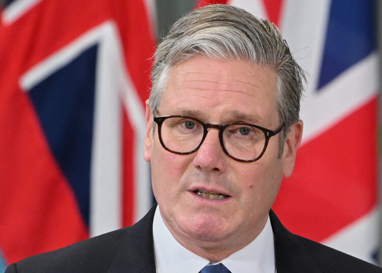 Britain's Prime Minister Keir Starmer speaks during a press conference at a military headquarters in north-west London on May 22, 2025. UK Prime Minister Keir Starmer announced Thursday he had signed an agreement to return the remote Chagos Islands to Mauritius in return for continued use of a key military base. (Photo by Thomas Krych / POOL / AFP)