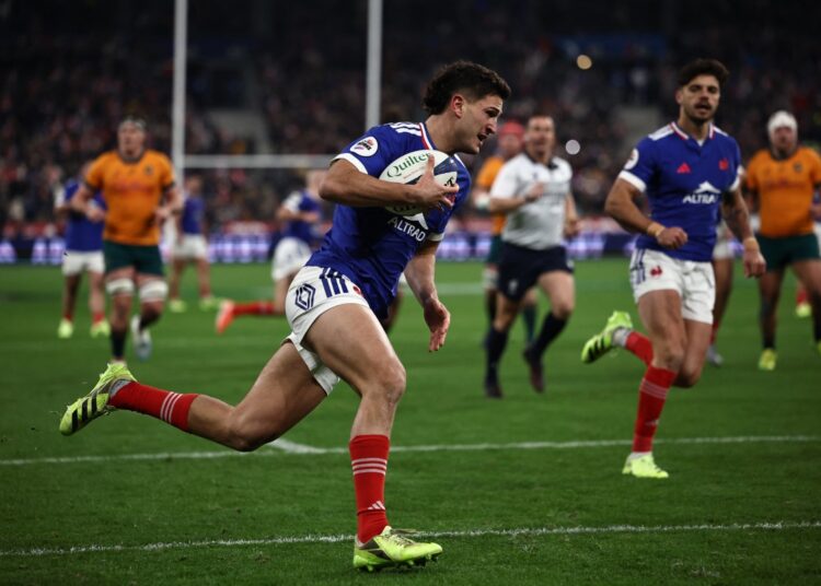 France's centre #13 Nicolas Depoortere runs to score a try  during the Autumn Nations Series international rugby union test match between France and Australia at the Stade de France in Saint-Denis, north of Paris, on November 22, 2025. (Photo by Anne-Christine POUJOULAT / AFP)