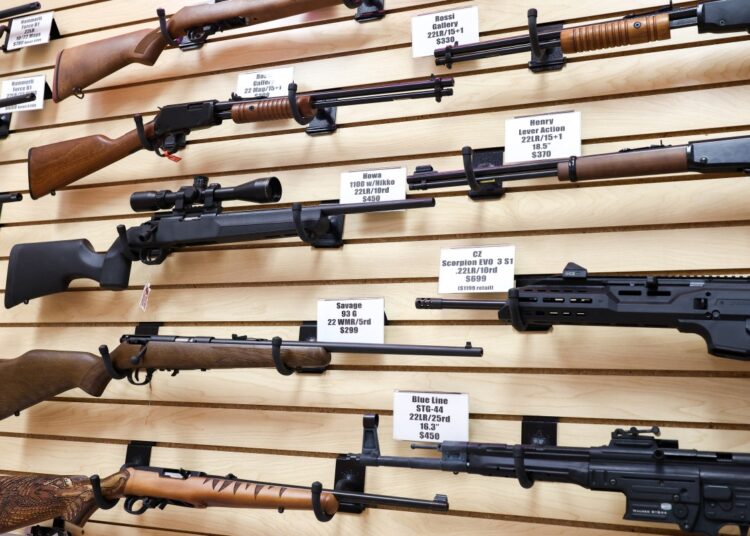 Firearms are displayed for sale in a gun store in Rio Rico, Santa Cruz County, Arizona on September 17, 2025. (Photo by CHARLY TRIBALLEAU / AFP)