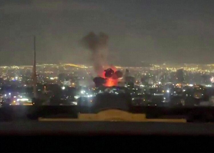 This video grab taken from UGC images posted on social media on March 1, 2026 shows an explosion following a strike on Tehran that appears to have occurred near state television channel IRIB. The United States and Israel launched strikes against Iran on February 28, with Israel's public broadcaster reporting that the Iranian supreme leader had been targeted, as the Islamic republic retaliated with barrages of missiles at Gulf states and Israel. (Photo by UGC / AFP) / NO USE AFTER MARCH 16, 2026 20:56:18 GMT - RESTRICTED TO EDITORIAL USE - MANDATORY CREDIT AFP -  SOURCE: UGC / UNKNOWN - DISTRIBUTED AS A SERVICE TO CLIENTS - NO RESALE -