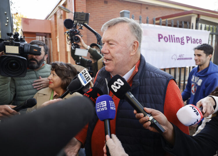 One Nation candidate David Farley speaks to the media at a polling station during the Farrer By-Election in Albury, New South Wales on May 9, 2026. (Photo by Hilary WARDAUGH / AFP)