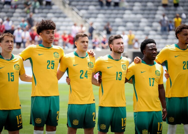 Members of Australia's national team sing their national anthem before the international friendly football match between Switzerland and Australia at Snapdragon Stadium in San Diego, California, on June 6, 2026. (Photo by SANDY HUFFAKER / AFP)